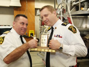 Greater Sudbury Fire Chief Dan Stack, left, and Greater Sudbury Police Chief Frank Elsner each want to claim bragging rights at the annual Police vs Firefighters hockey game on March 22. The hockey game, which will raise funds for the Rick McDonald Memorial Committee, will be held at 7 p.m. at the Gerry McCrory Countryside Sports Complex. The Money raised will be used to purchase hockey equipment for a youth group. See video at www.thesudburystar.com JOHN LAPPA/THE SUDBURY STAR/QMI AGENCY