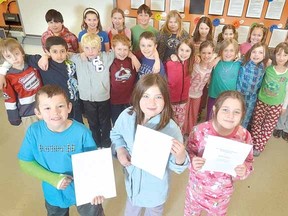 Young historians Braydon Tinning, Enya Gough, Isabella Sabatini, all 9, and their Grade 4 classmates at Avon Public School were big winners in a recent history essay competition.  (SCOTT WISHART, The Beacon Herald)