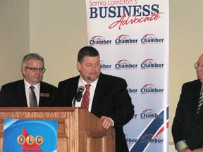 Lambton's new Warden Todd Case, centre, and MPP Bob Bailey, right, were guest speakers at a breakfast Friday hosted by the Sarnia Lambton Chamber of Commerce. At left is Chamber President Rory Ring. (CATHY DOBSON, The Observer)