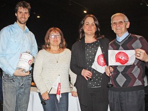 The Porcupine United Way held its Annual Campaign Touchdown at the Timmins Museum: National Exhibition Centre on Friday night to announce its astounding fundraising total of $401,523 for the 2012 campaign year, smashing its original goal of $380,000. The organization also used the evening to thank volunteers, businesses and supporters who helped in the efforts. Among those celebrating the good times were, from left, Porcupine United Way campaign cabinet members David Foster and Donna Lazure, co-chair Terri Scott, and cabinet member Fern Tremblay.