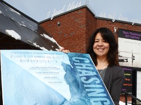 Leanne Wright, manager of marketing and development at the Tom Thomson Art Gallery, with a poster for Chasing Ice, one of six films to be shown at the annual Reel Festival, which runs March 2-3 at the Roxy Theatre.