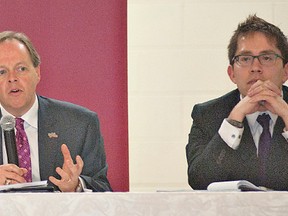 Jeff Fielding (left), CAO for the City of Burlington and Ron McLester (right), aboriginal education and student affairs at Mohawk College listen as Brant Community Healthcare System President and CEO Jim Hornell speaks during a leadership development forum for local government staff held Thursday at the Civic Centre auditorium. (BRIAN THOMPSON The Expositor)