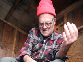 Bud Richardson, 83, of Selkirk works on a tasty perch dinner.  (JEFF TRIBE QMI Agency )