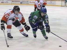 The Melfort Mustangs' Anthony Pickering works his way around a Yorkton Terriers player during the Mustangs' 5-1 victory on Friday, February 22 at the Northern Lights Palace