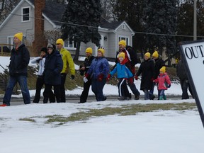 Some of the almost 100 people who participated in the Out in the Cold Walkathon on Saturday, Feb. 23, 2013, in Brantford— part of the Coldest Night of the Year series of events held across Canada. These walkers raised pledges to support the Why Not CIty Missions / Youth Centres and the Out of the Cold Program at the YES Church.HUGO RODRIGUES / BRANTFORD EXPOSITOR / QMI AGENCY