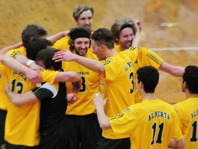 The Alberta Golden Bears volleyball team, seen here celebrating at the Saville Community Sports Centre in February, are among the many elite athletes that will train at the U of A's new High Performance Training and Research Centre in the Saville Centre. Photo by Trevor Robb/Edmonton Examiner