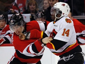 Ottawa 67s Joseph Blandisi, left, fights' Belleville Bulls' Jordan Subban, right, during the third period of OHL action at Scotiabank Place Sunday, Feb. 24, 2013. Belleville won 6-3.