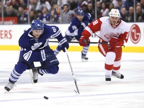Phil Kessel and Ian White could be chasing each other down more often in years to come if the Maple Leafs and Red Wings wind up back in the same division, as has been proposed. (MICHAEL PEAKE/Toronto Sun)