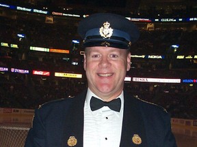 QMI file photo

Retired OPP officer Lyndon Slewidge, shown in a 2001 photo, sings the national anthem at Ottawa Senators home games.
