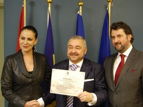 Black River-Matheson’s Dr. George Freundlich, centre, was named an International Humanitarian, Philanthropist and Cultural Ambassador by his home country of Romania. He was presented with the award from Antonella Marinescu, the Consul General of Romania, and Dr. Doru Liciu, Consul of Romania.