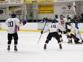 The Gananoque Islanders celebrate after scoring one of their seven goals in a 7-1 win over the Westport Rideaus Sunday night in Gananoque.