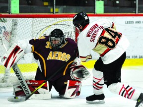 Athens Aeros goalie Erik Miksik stops Brockville Tikis forward Sawyer Woodside on a breakaway during Game Six of their Rideau-St. Lawrence Jr. B semifinal series on Sunday night at the Memorial Centre. (STEVE PETTIBONE The Recorder and Times)