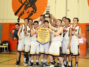 Members of the Korah Colts senior boys basketball team celebrate after winning the NOSSA AAA gold medal on Saturday.