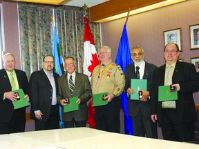 MP Brian Storseth (second from left) recently presented Queen’s Diamond Jubilee Medals to (from left) Ernie Isley of Bonnyville, George Hanna of Bonnyville, Ian Lovie of Cold Lake, Ajaz Quraishi of Cold Lake and Dennis Germain of Bonnyville.