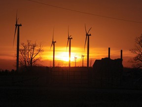 The sun sets behind wind turbines at the Ripley Wind Power project west of Ripley, Ont. in Bruce County. (TROY PATTERSON/KINCARDINE NEWS)