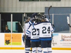 After two periods of back-and-forth hockey, the Saugeen Shores Winterhawks stepped it up a notch in the third period by scoring an additional five goals, winning 8-4 against the Shelburne Muskies in Game 1 of the North Division semi-final round. Pictured are the ‘Hawks celebrating after Blake Underwood scored their second goal of the game in the second period.