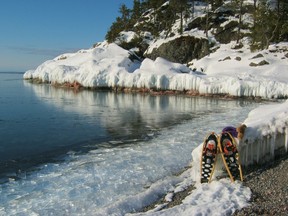 A sunny day at a Lake Superior beach is a warm respite from a long, cold winter.