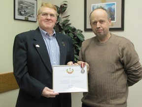 Honoured by the Federation of Canadian Municipalities, Mayerthorpe Mayor Kim Connell, left, is presented a Queen’s Diamond Jubilee medal by Deputy Mayor Dave Hutchison at town council’s policies and priorities meeting on Tuesday, Feb. 19.