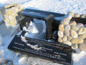 This bench, a contribution by community members to the Mayerthorpe Cemetery, was damaged, at about some time in midFebruary and the photograph was taken on Thursday, Feb. 21. RCMP are investigating.