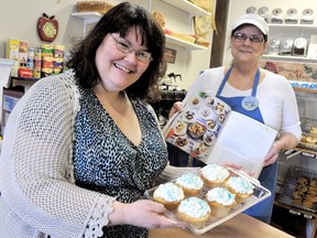 Robyn Brady, representative of the Kent Branch OSPCA and Deborah Chandler, owner operator of Big Ricky's Bake Shop, were ready for the onslaught of supporters with a sweet tooth during National Cupcake Day in support of SPCA's across the country. PHOTO TAKEN CHATHAM, On. Monday February 25, 2013. DIANA MARTIN/ THE CHATHAM DAILY NEWS/ QMI AGENCY