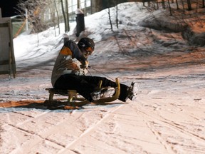 Today sports reporter Trevor Howlett tries his hand at some luge-sledding at Vista Ridge. Tom Power/Supplied