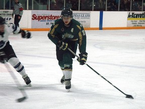 St. Thomas Stars forward Colin Mooney, right, skates the puck into the London Nationals' zone during Sunday nights 3-1 win at the Timken Centre. The Stars won their last regular game of the season but are back in action for the playoffs Wednesday in London against the Nationals. (Nick Lypaczewski Times-Journal)