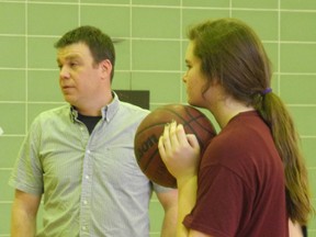 Cornwall Collegiate and Vocational School teacher Jean-Francois Lefebvre, left, coaches both junior and senior sports teams. He was coaching girls basketball on Monday after school. The Ontario Secondary School Teachers' Federation encouraged it's members on Friday to resume voluntary and extra curricular activities.
Erika Glasberg staff photo