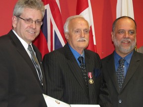 The Timmins community said goodbye to Gerry Petroski on Monday. Petroski passed away on Feb. 18 at the age of 70 after battling leukaemia. On Dec. 7, 2012, he was awarded the Queen Elizabeth II Diamond Jubilee Medal for his tireless community volunteer work. Pictured at the ceremony in December are, from left, MP Charlie Angus (NDP – Timmins-James Bay), Petroski, and MPP Gilles Bisson (NDP – Timmins-James Bay).