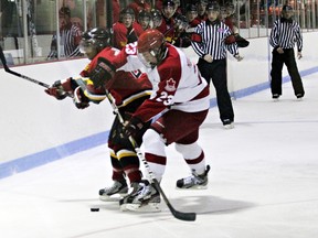 GREG COLGAN, QMI Agency

Norwich defenceman Zach Core knocks Paris forward Brandan Verasamy off the puck in the second period of Game 3 of their best-of-seven West Division semifinal series.