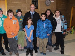(L. to R.) Nicole Fedorychka, Brandon Taylor, Dylan Richardson, Melfort Mayor Rick Lang, Cadence Bott, Lucas Wittig, Kelly Wittig and Payge Haugerud. Members of the local Girl Guides and Boy Scouts attended a special Thinking Day event at the Northern Lights Palace. The swimming event took place on Sunday, February 24 in honour of Thinking Day which was on Friday, February 22.