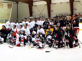 Before the puck drop, the Bull Tryhards (in black) took to centre ice along with the CUSW and special guests, the Tiverton Thunder Tykes for a commemorative photo.