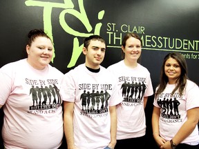 Students at St. Clair College Thames Campus are raising awareness for National Anti-Bullying Day. Shown from left are Chantelle Bernicky, Thames Student Inc. (TSI) community affairs director,  Kadyn Jacobs and Mairi MacIntyre, both of the child and youth worker program, and Alexandra Fraser, TSI president. PHOTO TAKEN Chatham, On., Tuesday February 26, 2013 TREVOR TERFLOTH/ THE CHATHAM DAILY NEWS/ QMI AGENCY