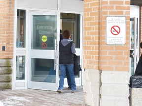 Gaetan Dinelle and a family member re-enter the courthouse following the extradition hearing on Tuesday in Cornwall.
Staff photo/KATHRYN BURNHAM