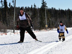The Porcupine Ski Runners' 33rd cross-country ski loppet was one of its most successful, attracting over 130 participants of all ages and skill level. Timmins youngster Carter Mairs, right, strives for the finish line as his father, Tyler, does his best to keep up.