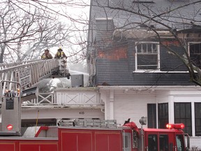 A fresh crew of Chatham firefighters arrived Wednesday morning, Feb. 27, 2013, to put out hots spots at a house fire at 416 King St. W. in Chatham, Ont., just east of Lacroix St. The fire broke out sometime around midnight in the large, two-storey home. (ELLWOOD SHREVE, The Chatham Daily News)