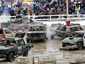 Smashed cars circle the ring during the inaugural Stirling Snow Smash Demolition Derby on Saturday at the Stirling Fairgrounds. The event was presented by the Stirling Agricultural Society with all proceeds from the derby going to the Stirling Fair.