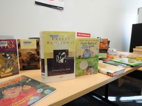 A selection of banned and/or censored books are displayed on a table at the Woodcroft branch as the Edmonton Public Library hosted a Banned Books Cafe last week. TREVOR ROBB Edmonton Examiner