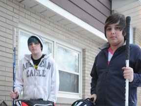 Ashlynn Schaefer, 14, right, and Zachary Schaefer, 11, have played hockey for several seasons now because of the Sarnia-Lambton YMCA Strong Kids Campaign. It launched this year's fundraising drive recently with a goal of $250,000. (BARBARA SIMPSON, The Observer)