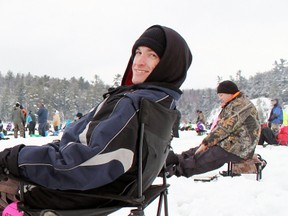 Steve Damvoise relaxes while waiting for a bite during the Elliot Lake Fishing Derby at Horne Lake on Saturday. 
Photo by JORDAN ALLARD/THE STANDARD/QMI AGENCY