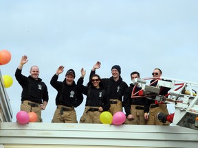 Six Fort McMurray Fire Department firefighters take part in the 2012 Rooftop Campout at Paddy McSwiggins. TODAY FILE PHOTO