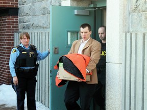 Kenneth Ivall leaves the Kenora courthouse Wednesday in police custody. He was found guilty of second-degree murder in the 2009 beating death of Edward Wilson.
Alan S. Hale for the Enterprise