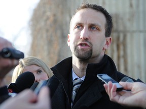 Chris Millsap, defense counsel for Brenden Holubowich, speaks to the media outside Grande Prairie Provincial Court Wednesday. (Adam Jackson/Daily Herald-Tribune)