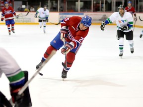 Hundreds came out to the McIntyre Arena on Wednesday night for the Put Prostate Cancer On Ice charity hockey game featuring several Montreal Canadien alumni versus the CTV Cheapskates. Canadien alum Normand Dupont lets a hard shot go from the faceoff circle on Cheapskates netminder Andy Barbato in the first period.