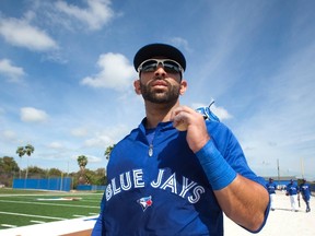 Jose Bautista (pictured) and Andy LaRoche were briefly teammates with the Pittsburgh Pirates. Now they’re together again in Toronto, though LaRoche, signed to a minor-league deal, will be sent down in a few weeks while Bautista will lead the Blue Jays. (Reuters)