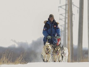 Aaron Peck takes his dogs for a training run as he prepares for racing in the Iditarod. (Randy Vanderveen/Special to Peace Country Sun)