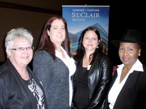 Darlene Gordon, far left, and Monica Caliste, wife of the late Robbins, far right, presented Shirley Peterbaugh, centre left, and Jamie-Lee Moreland, with the Chip Gordon and Larry Mansfield Robbins bursaries, respectively, during the St. Clair College students awards' ceremony at Club Lentina's Thursday, February 28, 2013, in Chatham, On. BOB BOUGHNER/ THE CHATHAM DAILY NEWS/ QMI AGENCY