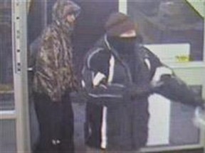 Pictured are two men involved in the armed robbery of convenience store on Saskatchewan Ave. early Wednesday morning. Anyone with information on the crime is asked to contact the Portage RCMP detachment. (SUBMITTED PHOTO)