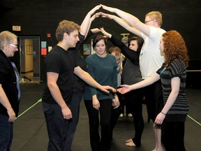 Director Annie Smith (left) rehearses a scene with the cast of ‘Halo’ at Grande Prairie Regional College. The GPRC Theatre Rising production will run eight shows between March 7 and 13. (Elizabeth McSheffrey/Daily Herald-Tribune)