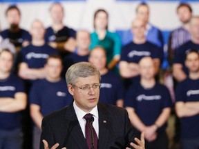Canada's Prime Minister Stephen Harper speaks during a news conference at Premier Tech Ltd. in Riviere-du-Loup, February 28, 2013. REUTERS/Mathieu Belanger