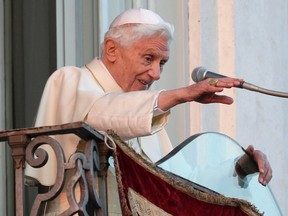 Pope Benedict XVI waves to well-wishers during his final official appearance as pontiff Thursday at the Vatican.
Reuters/QMI Agency